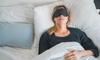 A woman sleeping to improve her HRV